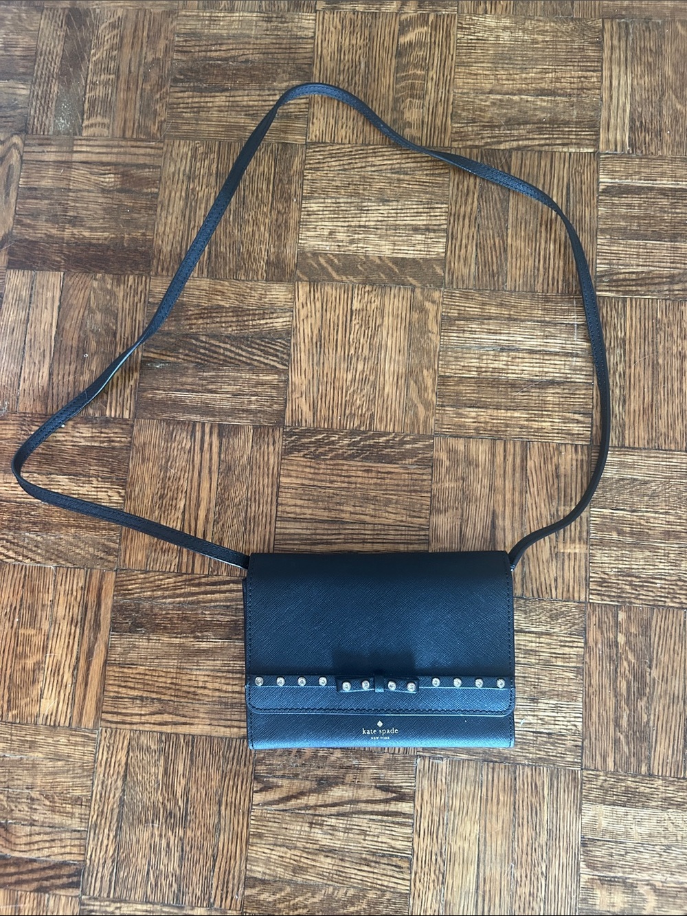 kate spade black crossbody wallet with studded trim